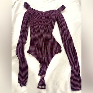 Xsmall bodysuit with shoulder cut outs